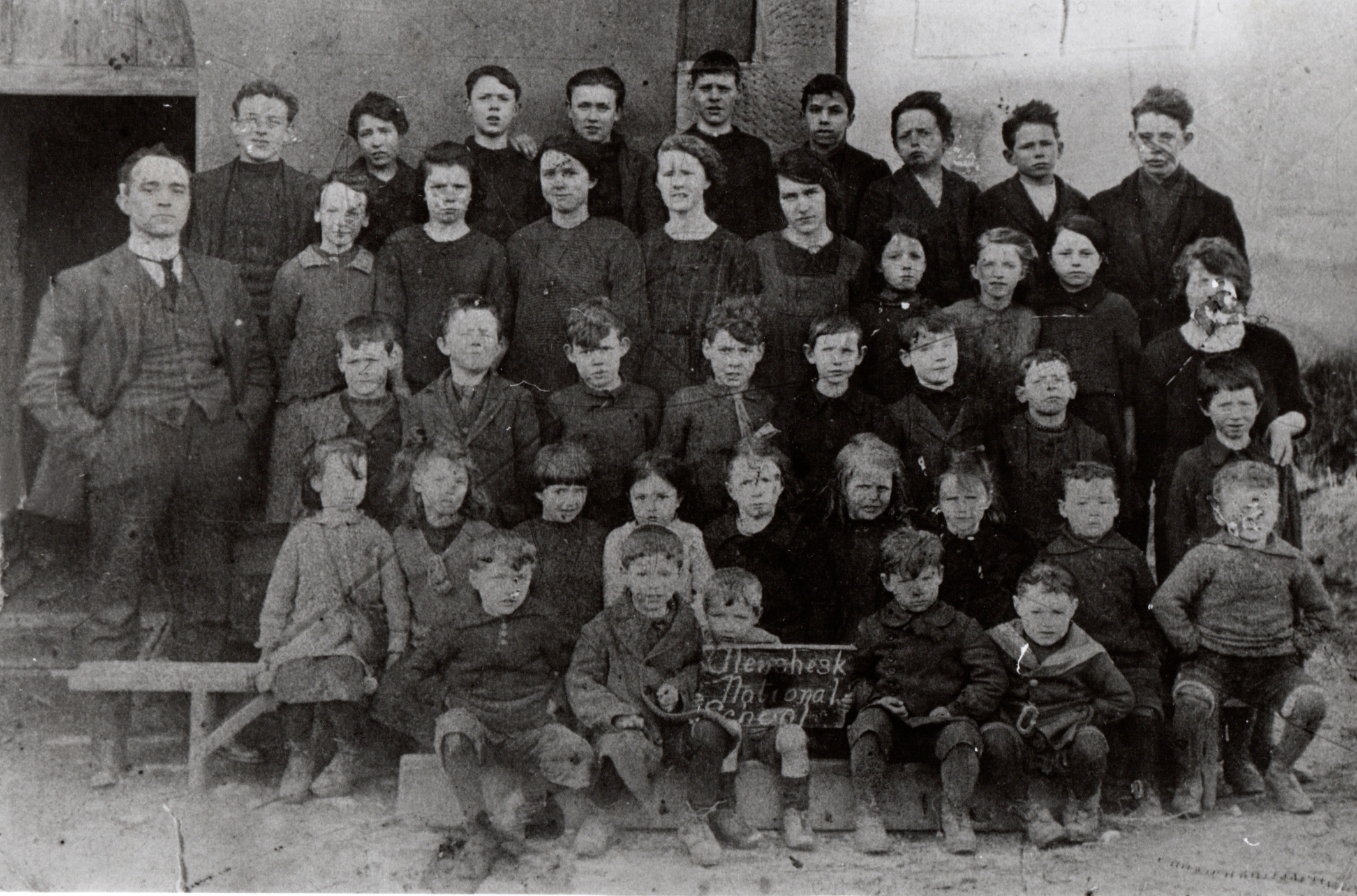Glenshesk School, late 1920's pr early 1930's, with Master Kelly and his wife in photo