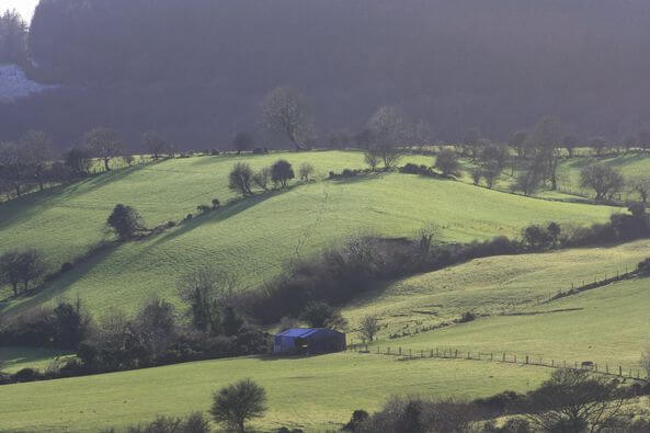 Sun catches the hills in Glenshesk at Sunset