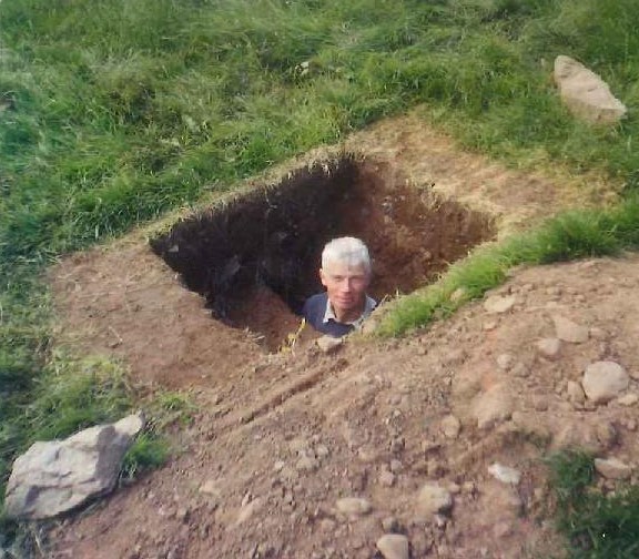 Joseph Bailey in the Souterrain that he discovered on his farm in Duncarbit, Glenshesk, 2000. Photo - Seamus Bailey